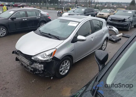 2015 Toyota Prius C Three from USA, damaged, VIN JTDKDTB32F1102537